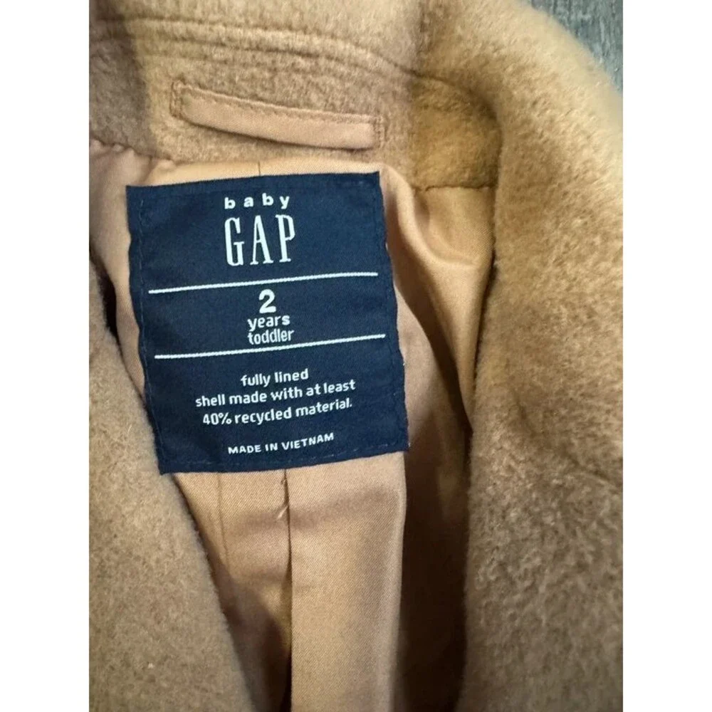 Camel color Gap Kids wool-blend coat features a notched collar button front. 2T